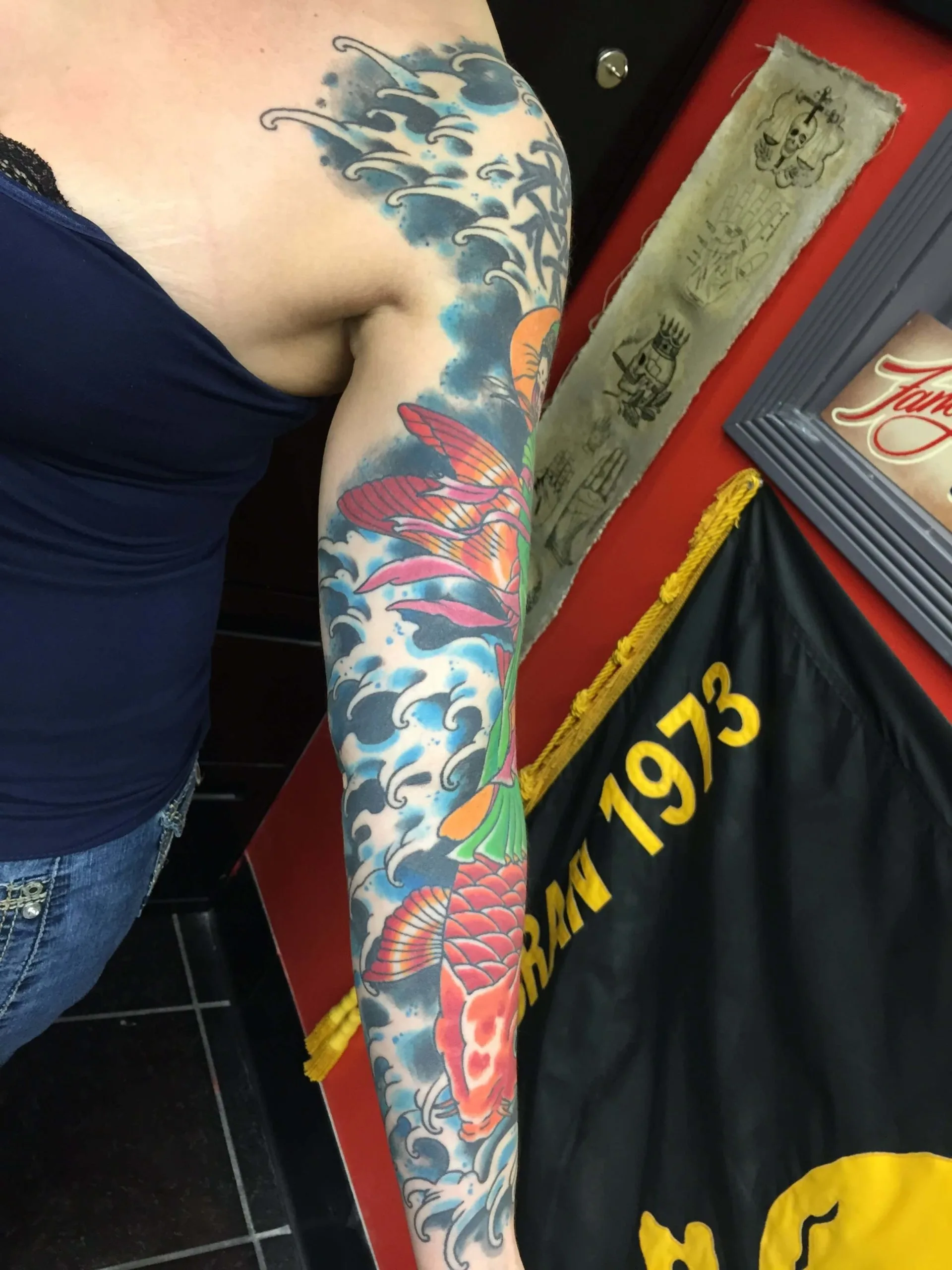 colour full sleeve with blue wave patterns, red and orange koi fish, and white water details